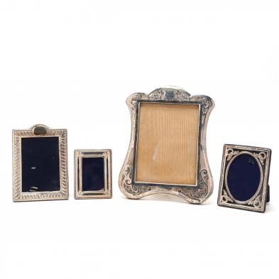 a-group-of-four-sterling-silver-frames