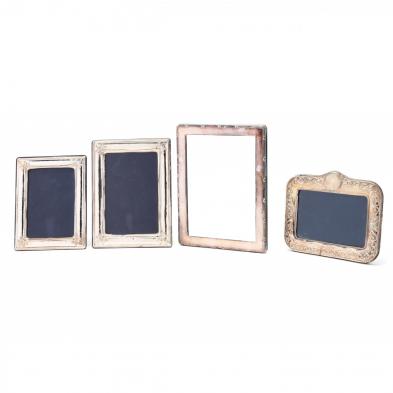a-group-of-four-sterling-silver-frames