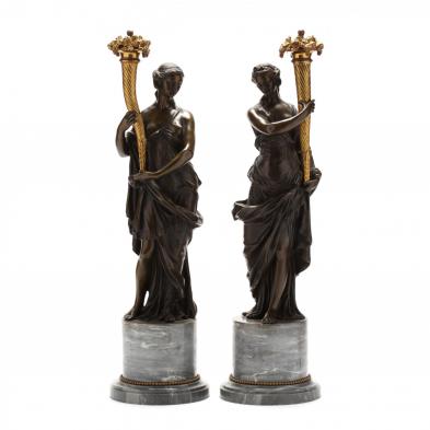 a-pair-of-ormolu-and-bronze-french-figural-torchieres