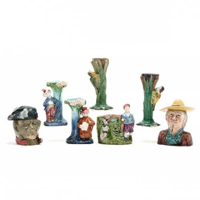 a-variety-of-seven-figural-majolica-vases
