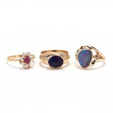 three-gold-and-gemstone-rings