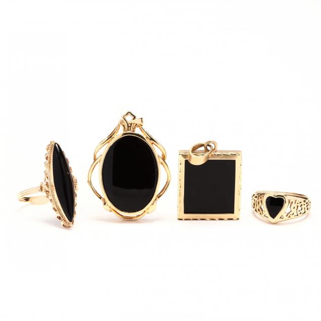 four-gold-and-black-onyx-jewelry-items