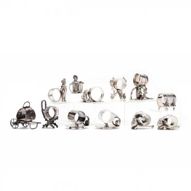 an-assembled-set-of-twelve-silverplate-figural-napkin-rings