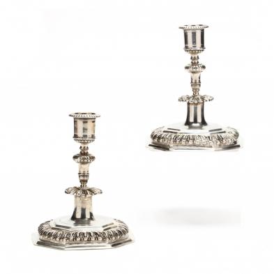 a-pair-of-antique-cast-fine-silver-candlesticks