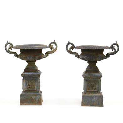 pair-of-cast-iron-urns-on-stands
