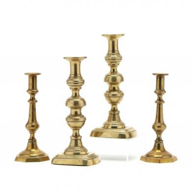 two-pair-of-antique-brass-push-up-candlesticks