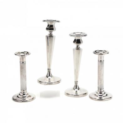 two-pairs-of-sterling-silver-candlesticks