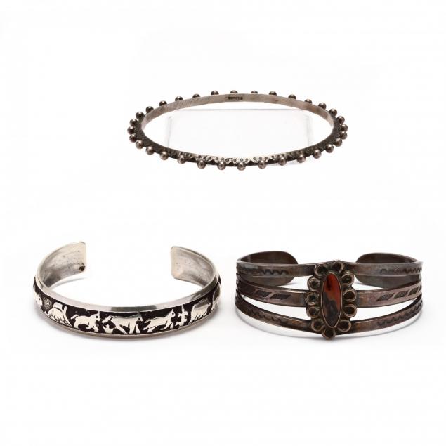 three-silver-bracelets