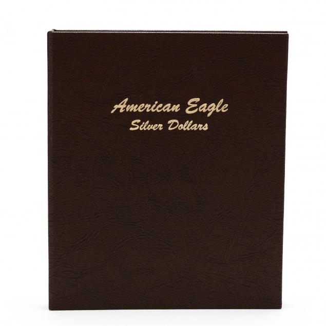 eleven-bu-american-silver-eagles-in-dansco-album