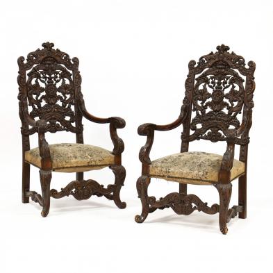 pair-of-renaissance-revival-carved-oak-hall-chairs