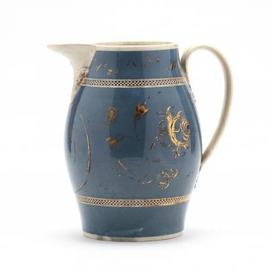 a-large-creamware-water-pitcher