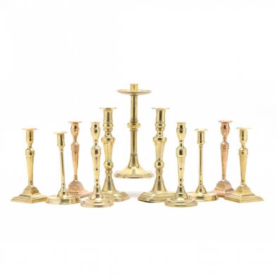 eleven-antique-brass-candlesticks