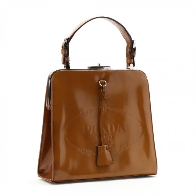 a-gold-patent-handbag-prada