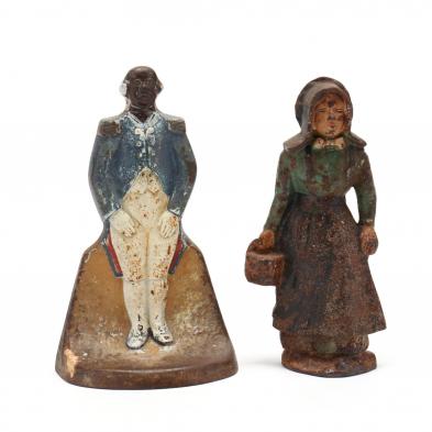 two-antique-figural-iron-doorstops