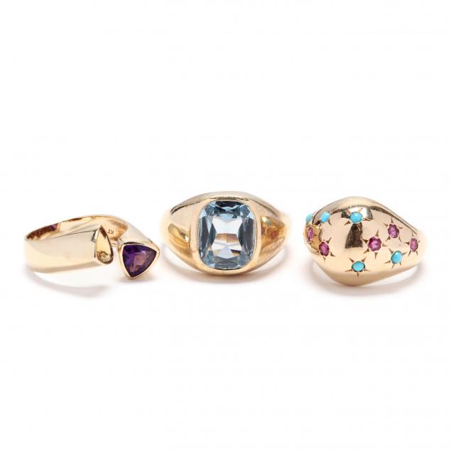 three-gold-and-gemstone-rings