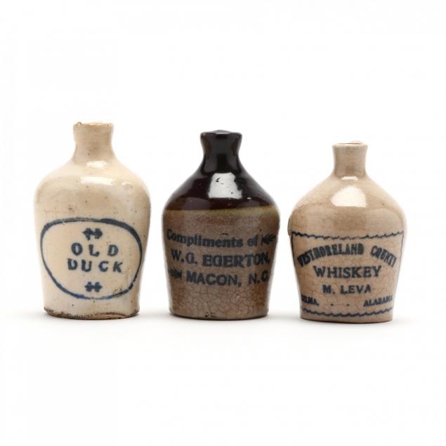 three-miniature-advertising-whiskey-jugs