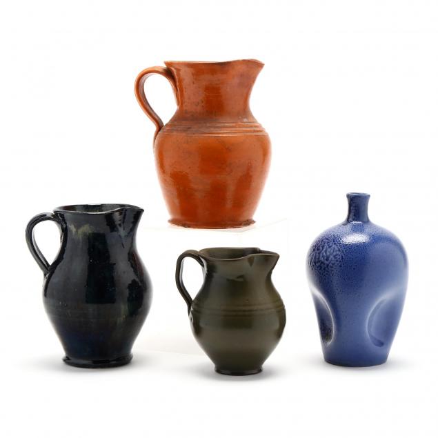 nc-pottery-a-selection-of-three-pitchers-and-a-pinch-bottle