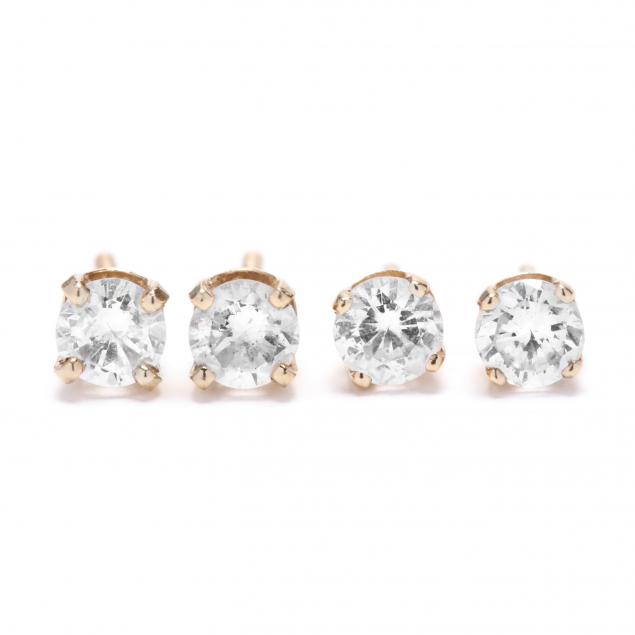 two-pairs-of-diamond-stud-earrings