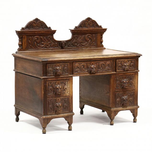 antique-continental-carved-oak-desk