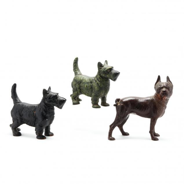 three-iron-dog-form-doorstops