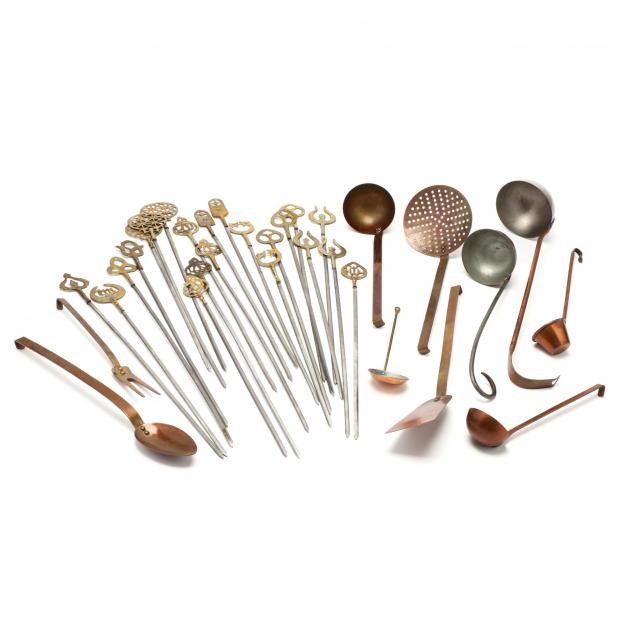 group-of-copper-utensils-and-skewers