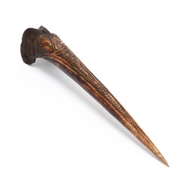 antique-new-guinea-carved-human-bone-dagger