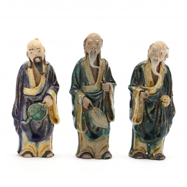 three-chinese-pottery-mud-men