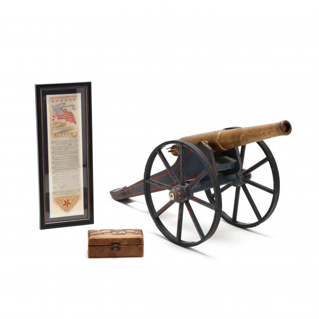 two-vintage-patriotic-items-with-a-related-toy-cannon