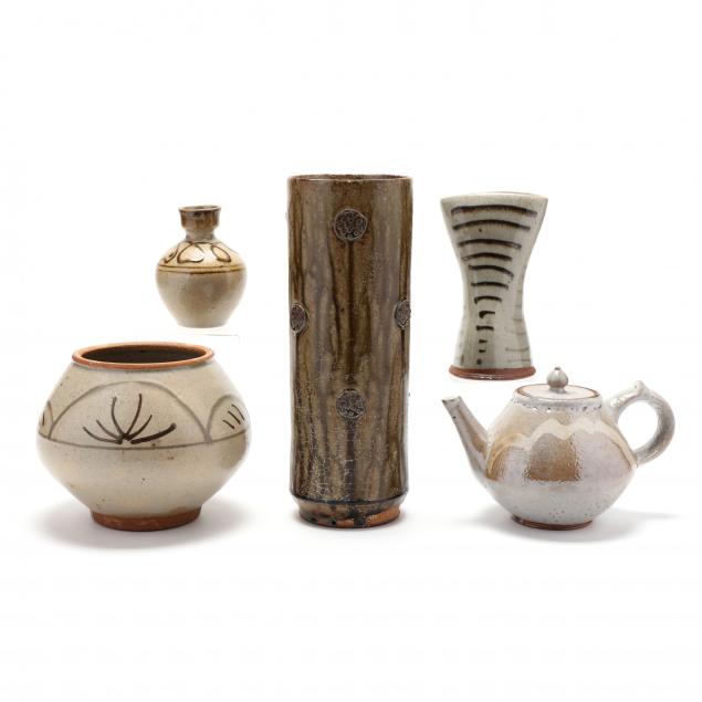 a-group-of-mark-hewitt-pottery-by-apprentices