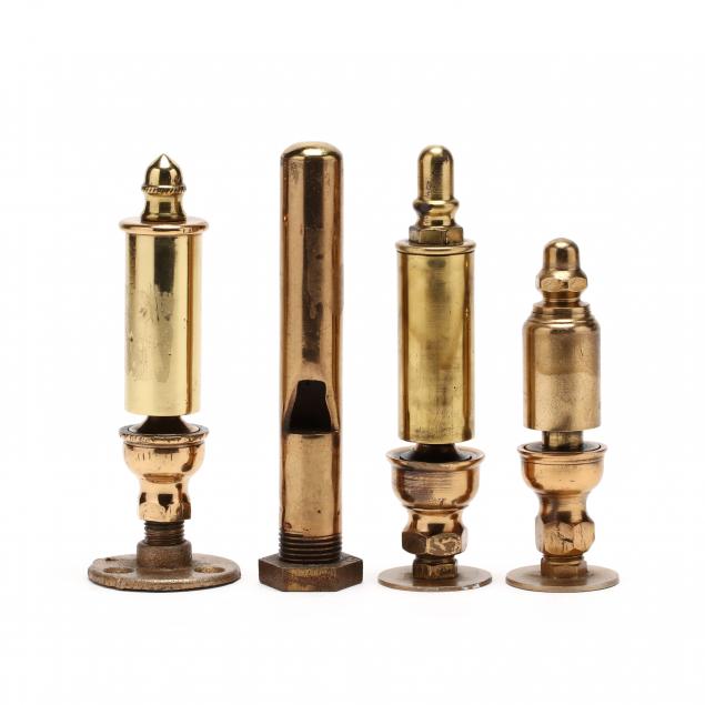 four-small-cylindrical-brass-whistles