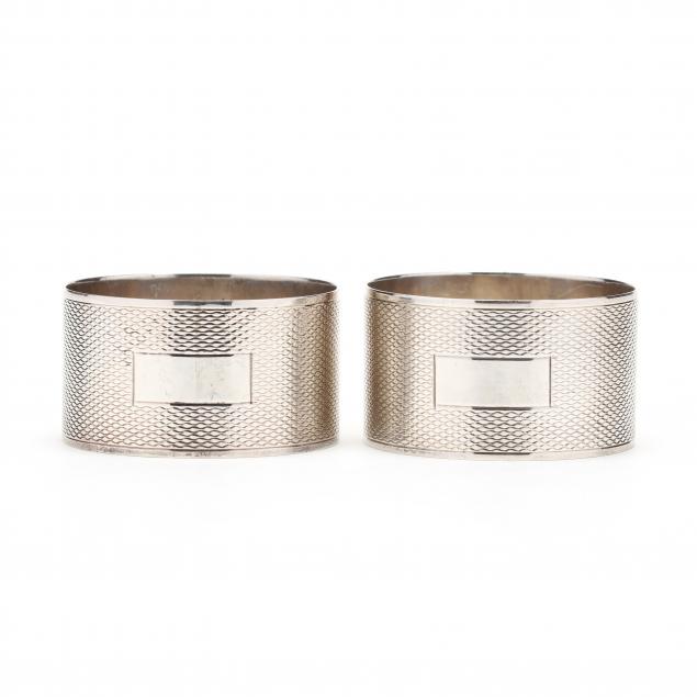 a-pair-of-elizabeth-ii-silver-napkin-rings