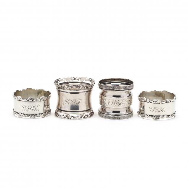 an-assembled-set-of-four-silver-napkin-rings