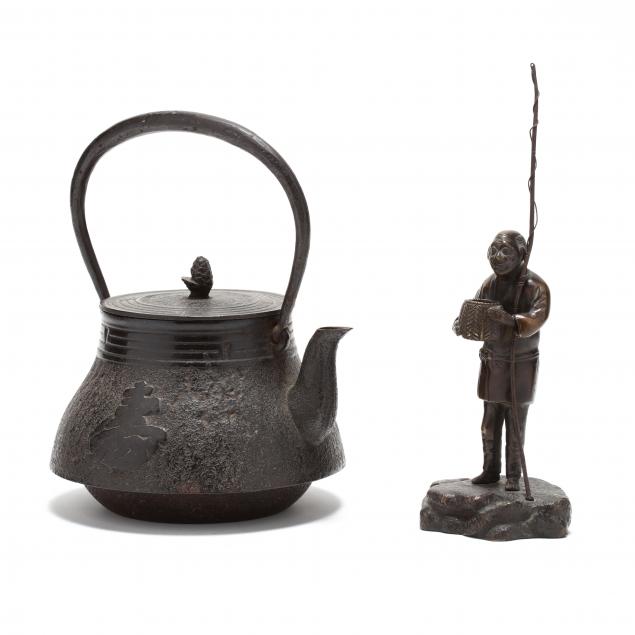 a-japanese-iron-teapot-and-bronze-fisherman-okimono