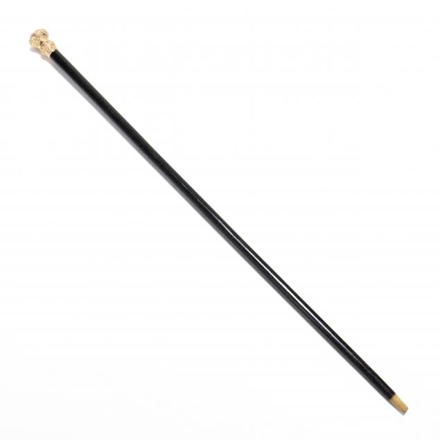 gold-topped-walking-stick