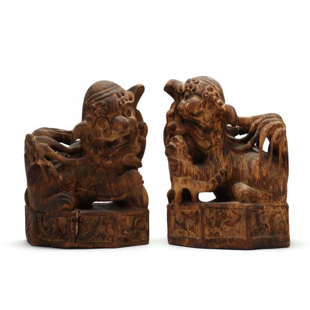 a-pair-of-chinese-carved-wood-foo-dogs