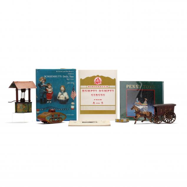 a-group-of-antique-toys-and-toy-related-books