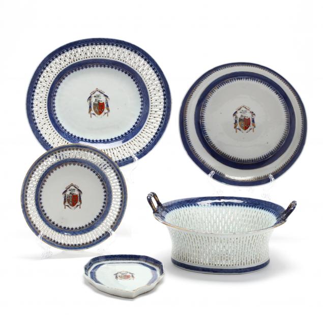 a-twenty-three-piece-chinese-export-armorial-porcelain-partial-set