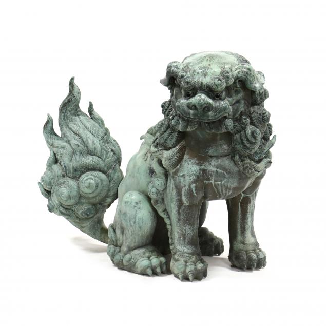 a-large-cast-and-patinated-bronze-foo-dog