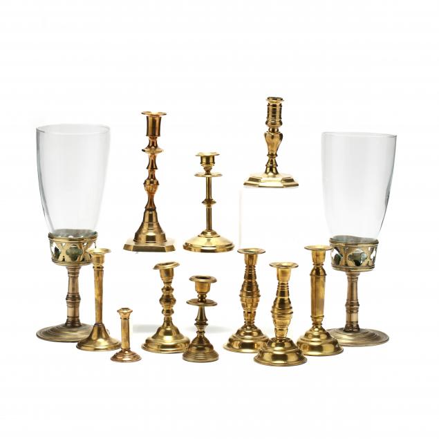 group-of-vintage-brass-candlesticks