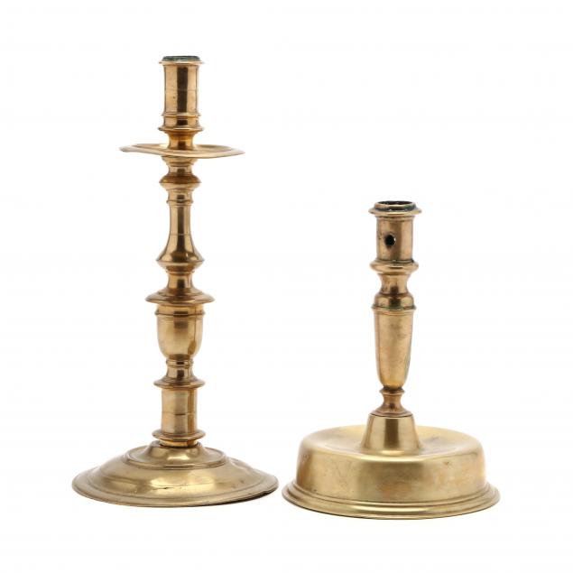 two-antique-brass-candlesticks