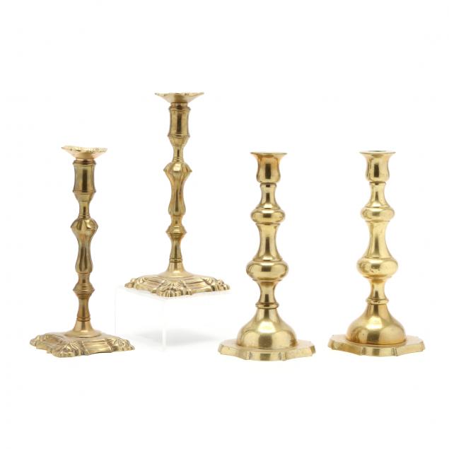 two-pair-of-antique-brass-candlesticks