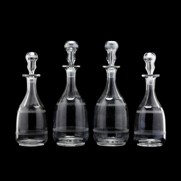 four-antique-etched-and-cut-glass-decanters