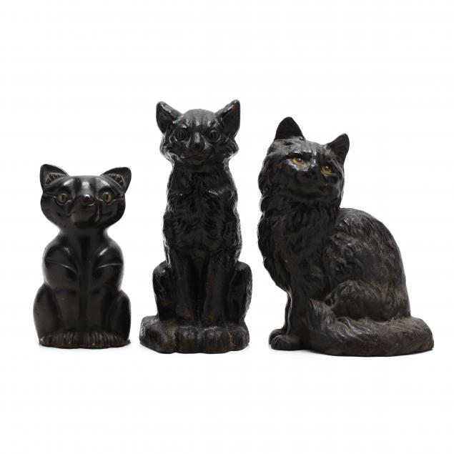 three-vintage-black-cat-doorstops