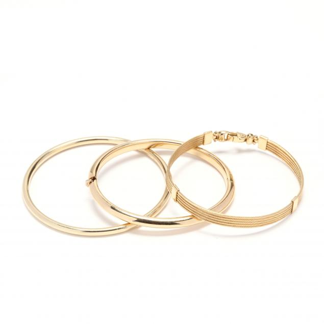 three-gold-bracelets