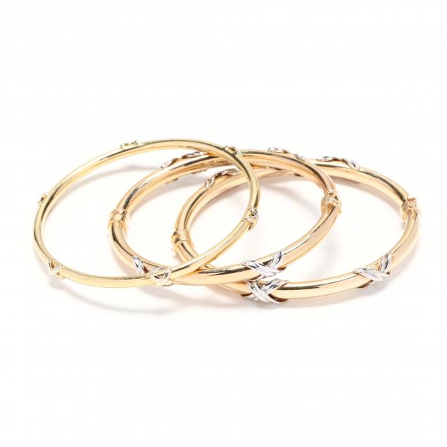 three-gold-bangle-braclets