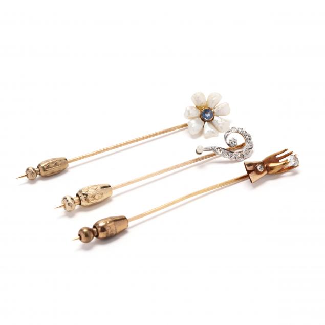 three-gold-and-gem-set-stickpins