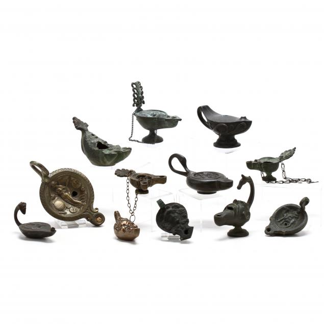 twelve-roman-style-brass-toned-oil-lamps