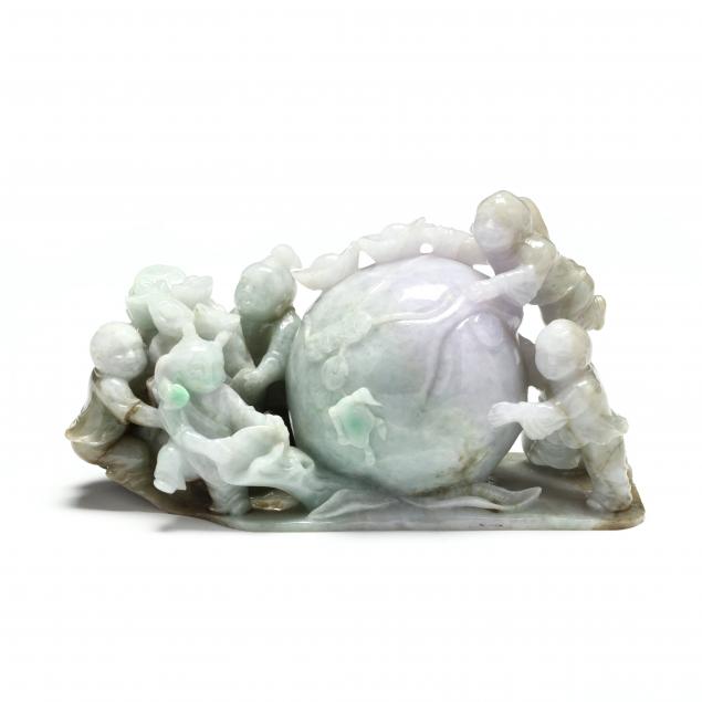 a-chinese-jade-carving-of-a-giant-peach-with-boys