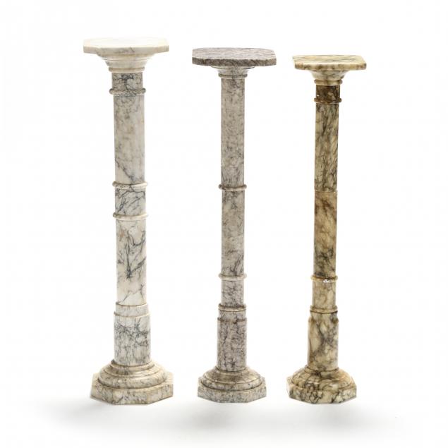 three-vintage-marble-pedestals