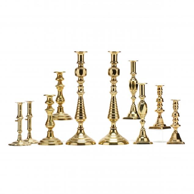 five-pairs-of-antique-brass-candlesticks